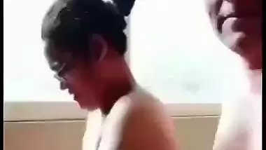 Husband fucks his naked wife in the kitchen in Indian porn