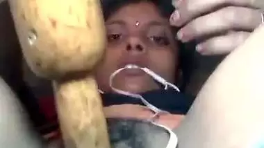 Desi using chapati rod dildo to masturbate