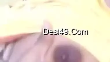 MILF reveals and XXX plays with her cute Desi tits for the camera