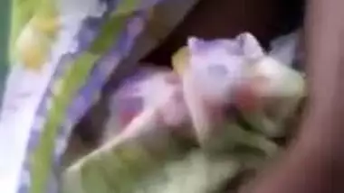 Indian diva in a colorful sari exposes touchable natural XXX boobs