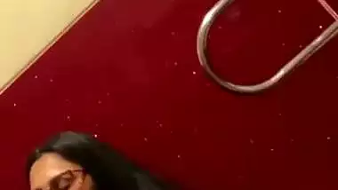 Chubby girl gives an outdoor blowjob in a cinema theatre