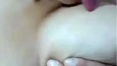 Indian girl poses with naked XXX breasts and licks her sex nipples