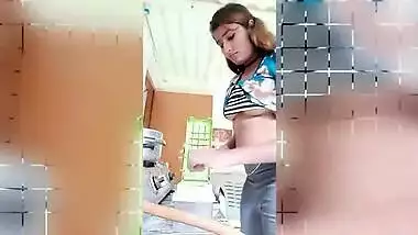Chubby Desi gal while cooking can barely hide her perky XXX boobs