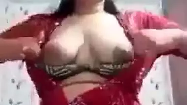 Sexy girl shows her boobs and ass to striptease her BF