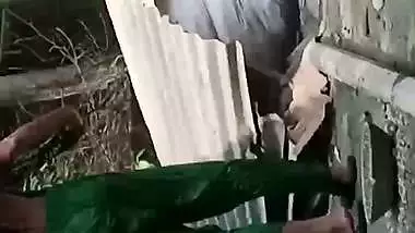 Village neighbor girl outdoor bath caught through hole