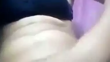 Delhi babe fingers her hairy pussy during a video call sex