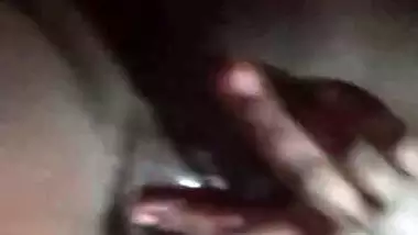 Village girl applying lotion to full nude body