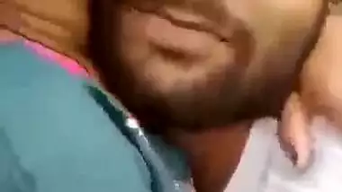 Indian outdoor sex of a guy sucking his GF’s tight boobs